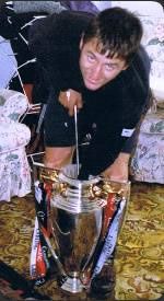 Gary the Dent Man removing a dent from the FA Premiership Trophy
